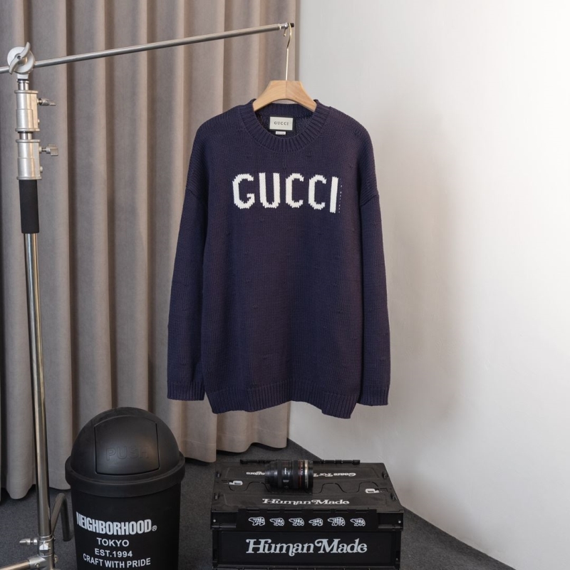 G*u*i sweaters